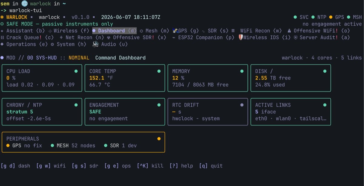 Warlock OS terminal dashboard running live on the deck